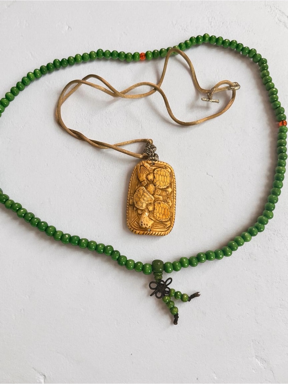 Green Beaded Necklace with Carved Pendant - Unbranded